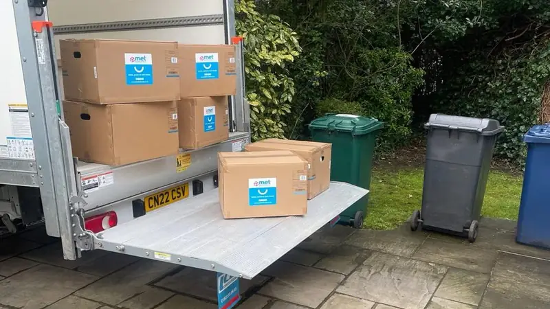 MET Removals van loaded with professionally packed boxes, packing services in Battersea