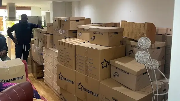 unnamed-2 MET Removals mover with packed boxes ready to load, office removals in Muswell Hill